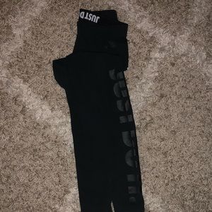 Nike black leggings with wording on side